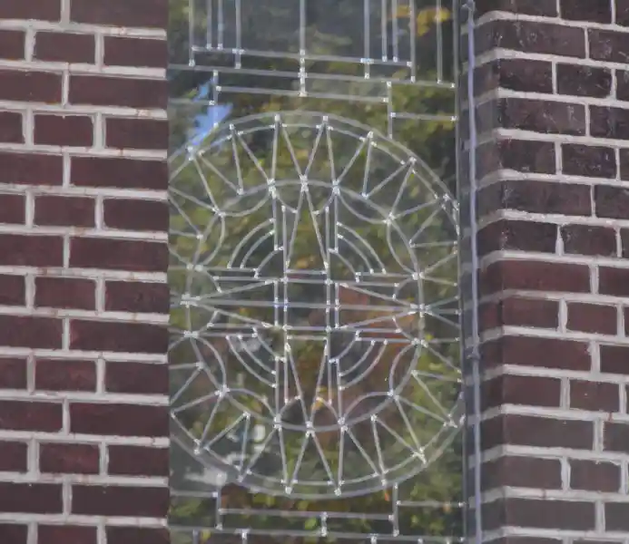 Cross inside a solar disc